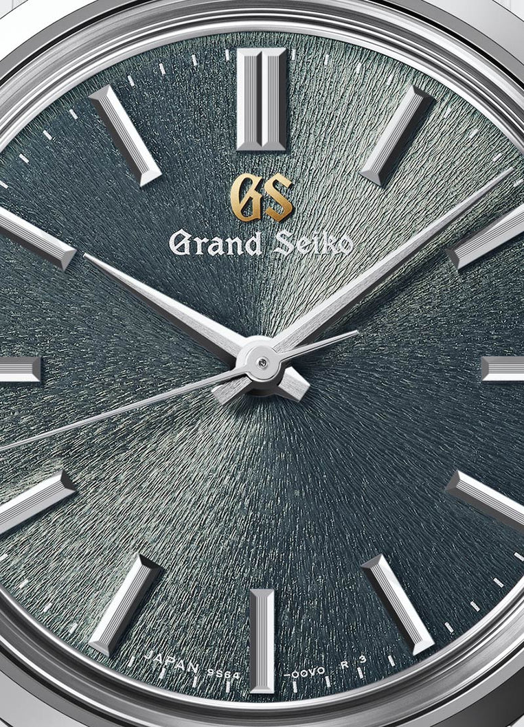 Grand Seiko SBGW311 green dial watch. 